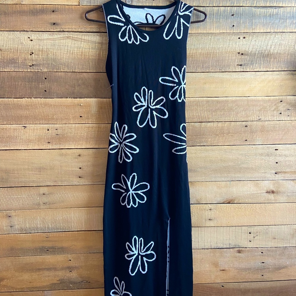 Black Floral dress with cut out back. Unknown brand, size S.